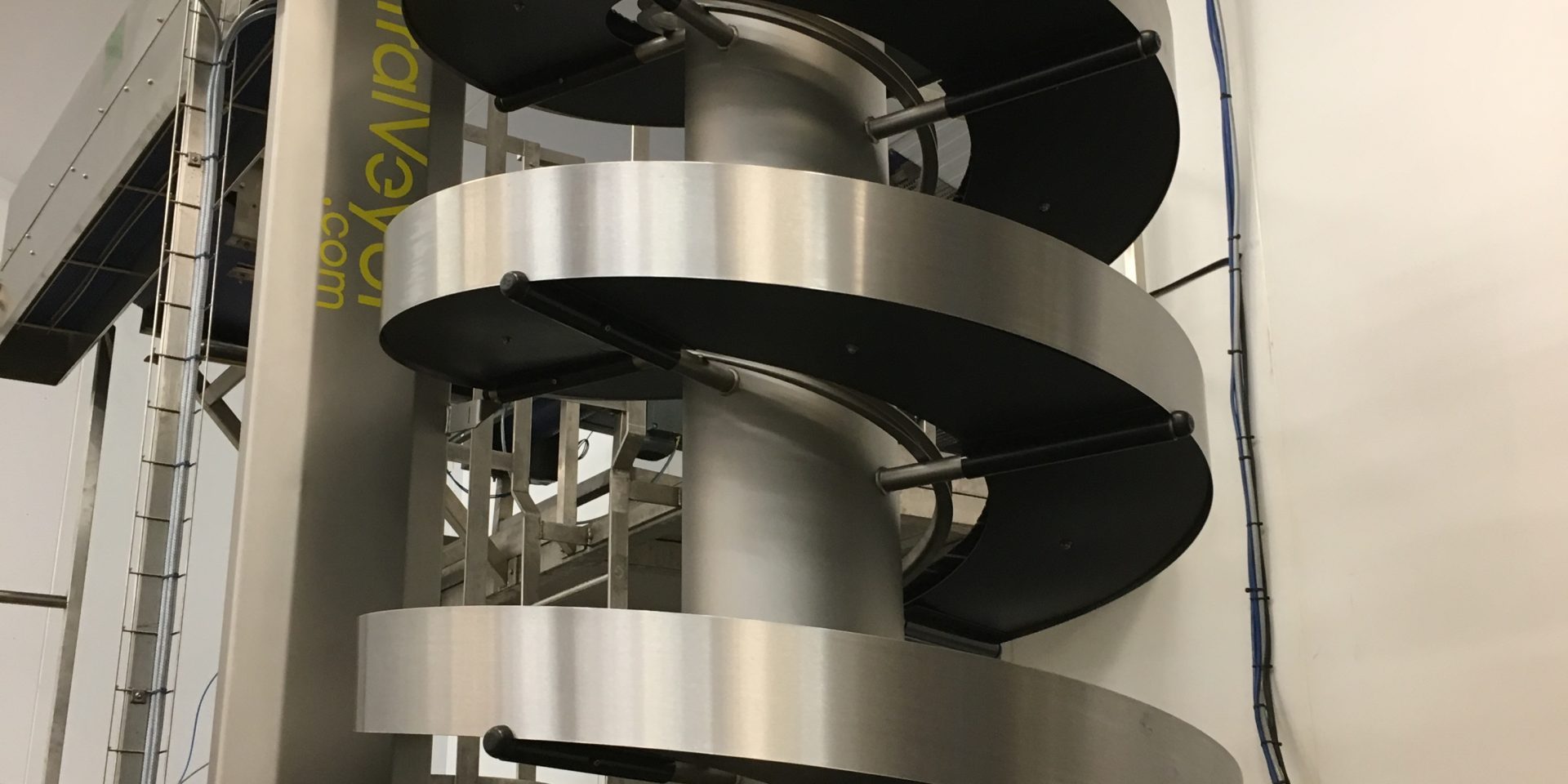 Benefits of Spiral Conveyors for Manufacturers in the Blow Molding Industry Benefits of Spiral Conveyors for Manufacturers in the Blow Molding Industry