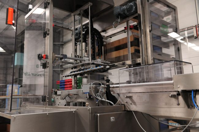 Streamlining Production Lines with Tray Packers Streamlining Production Lines with Tray Packers